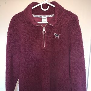 a burgundy 3/4 half zip (sherpa)